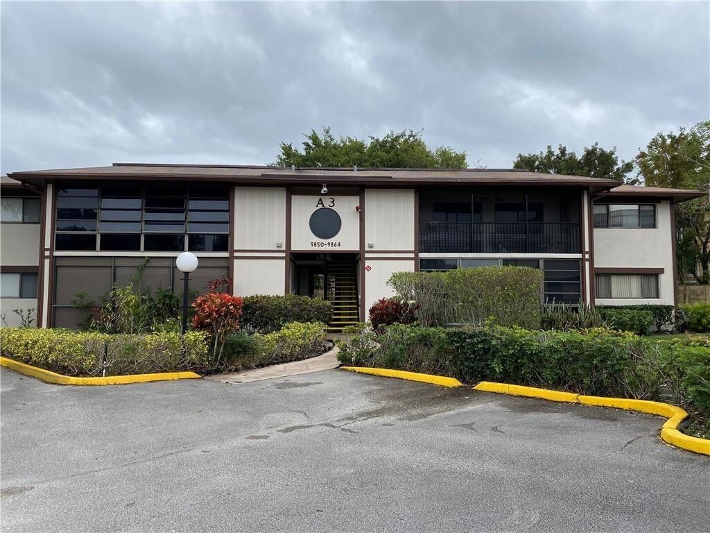 Property Photo:  9854 S Belfort Circle 211  FL 33321 