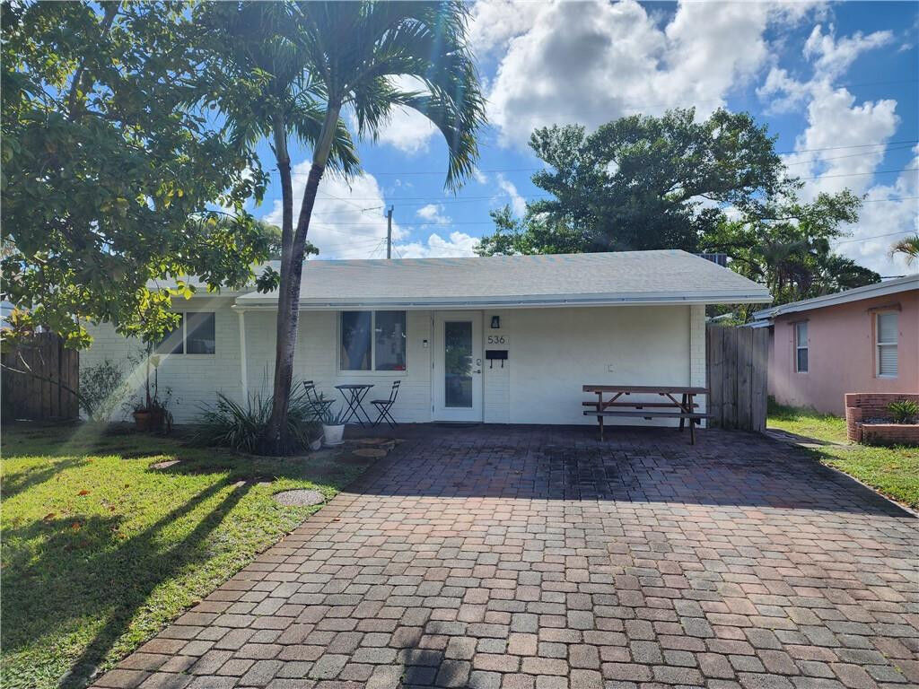 Property Photo:  536 NW 45th Street  FL 33309 