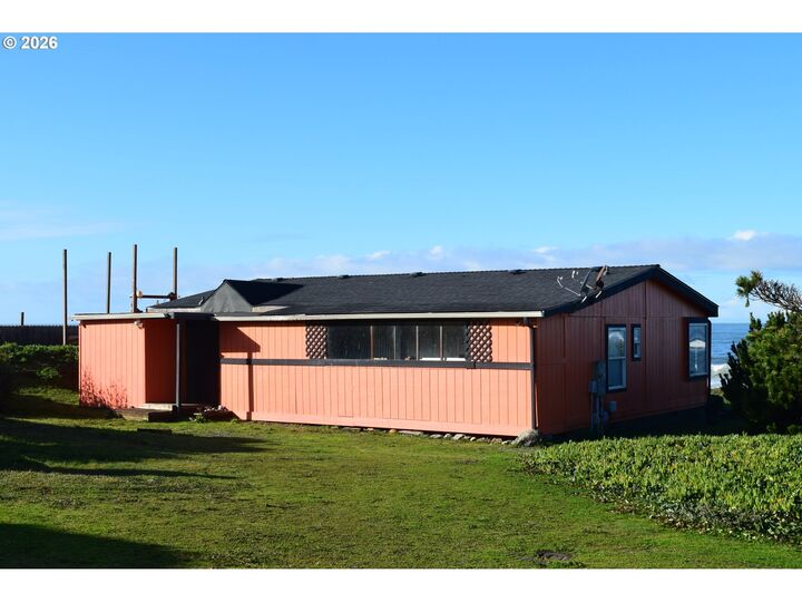Property Photo: 33130 Nesika Rd A OR 97444