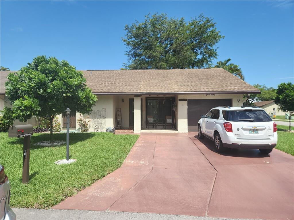 Property Photo:  1580 SW 21st Way  FL 33442 