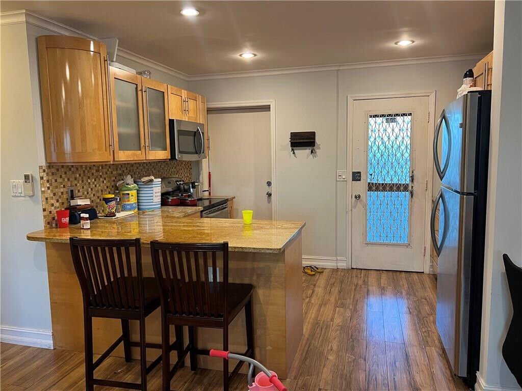 Property Photo:  1250 E Sample Road 208  FL 33064 