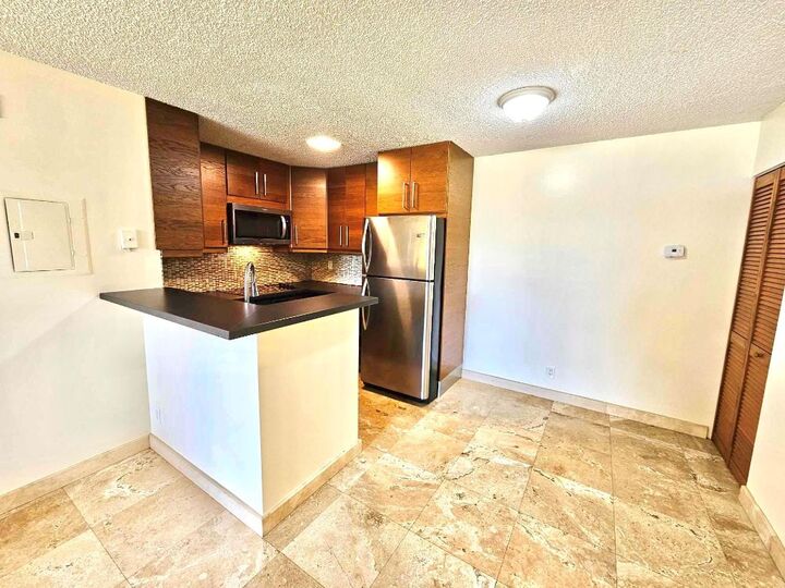 Property Photo:  851 Lyons Road 22106  FL 33063 