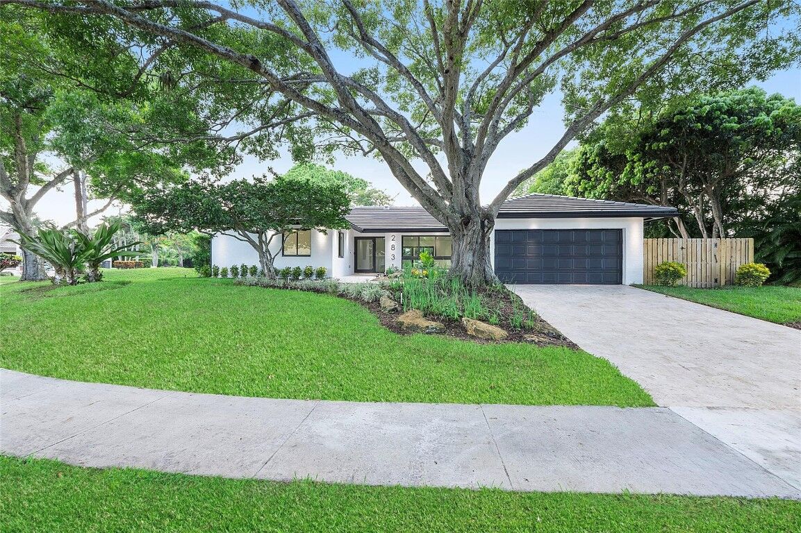 Property Photo:  2831 NW 23rd Court  FL 33431 