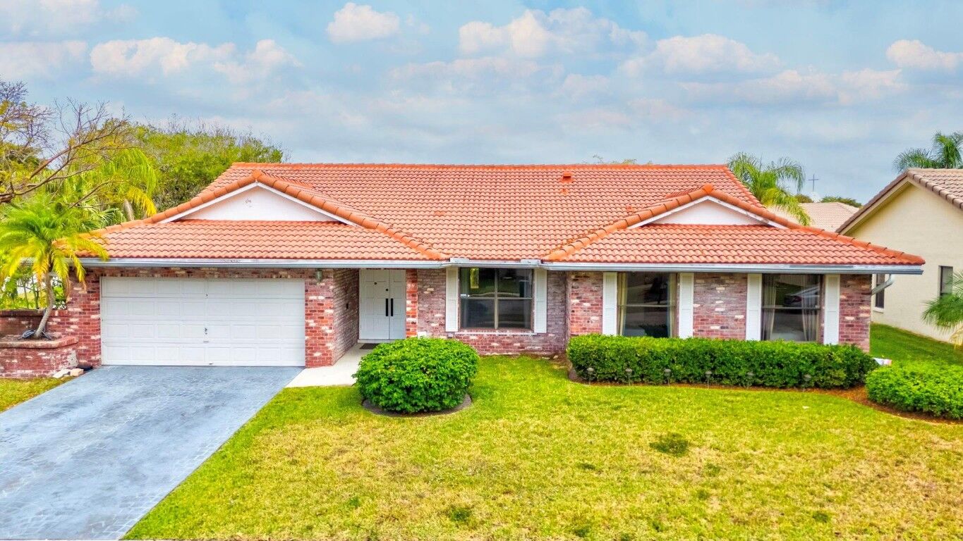 Property Photo:  7711 NW 18th Court  FL 33063 