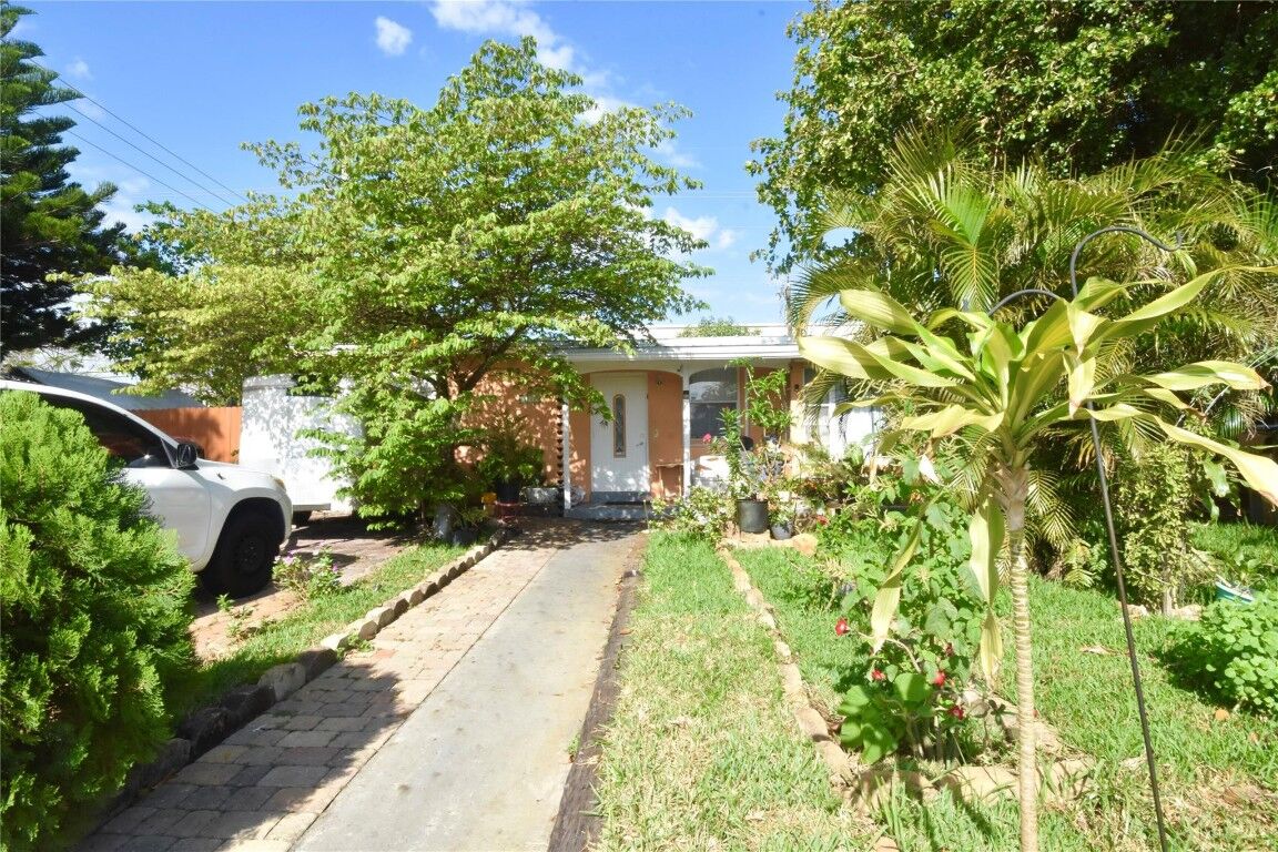 Property Photo:  5117 NE 14th Avenue  FL 33064 