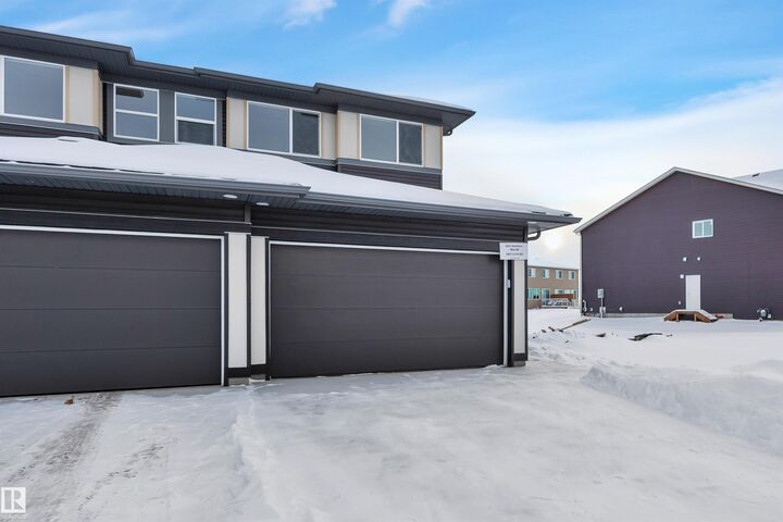 Property Photo: 5631 Hawthorn Way SW AB T6X 3K7