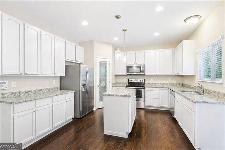 Property Photo:  1647 Shire Village Dr.  GA 30518 