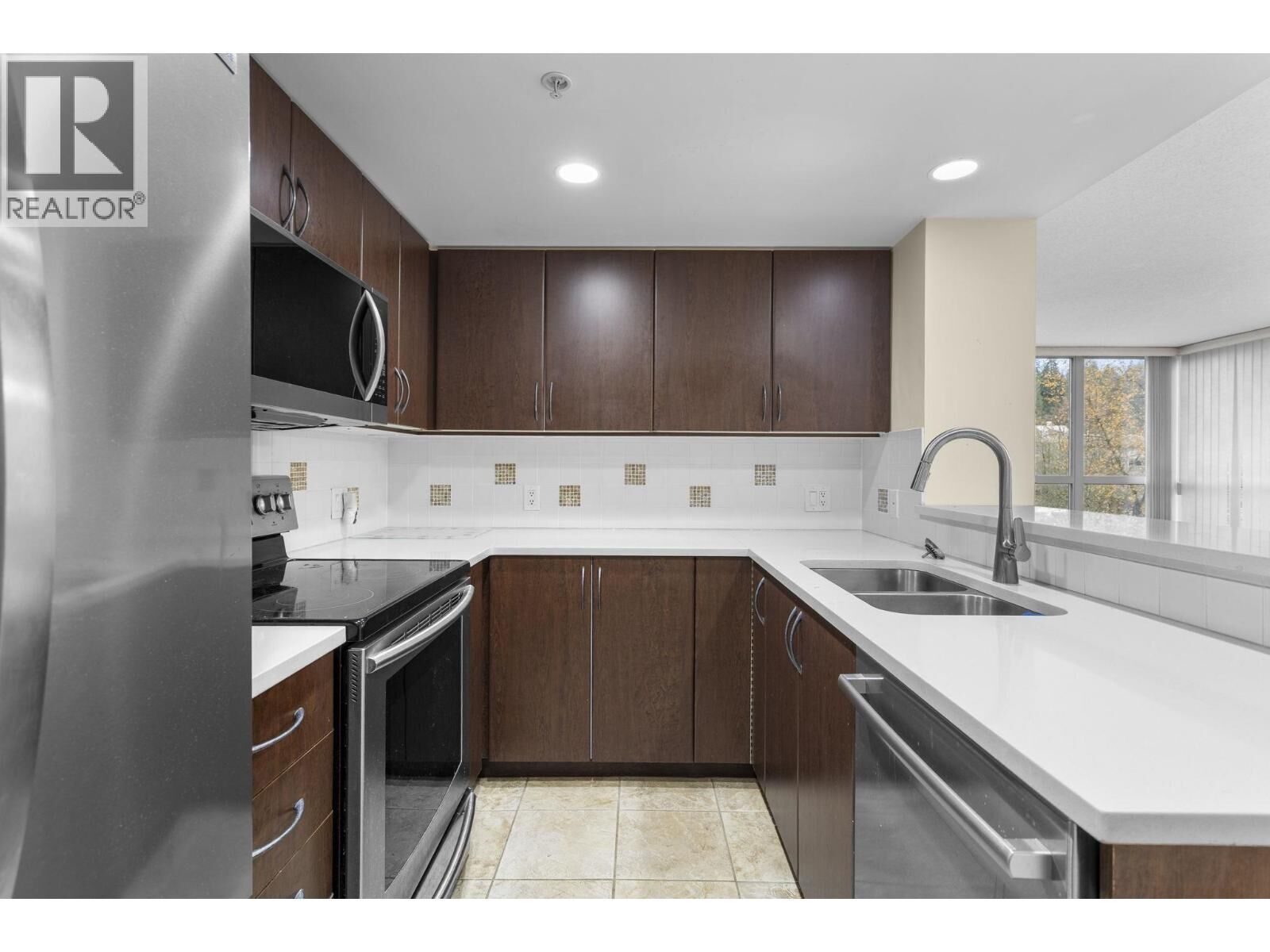 Property Photo:  290 Newport Drive 602  BC V3H 5N2 