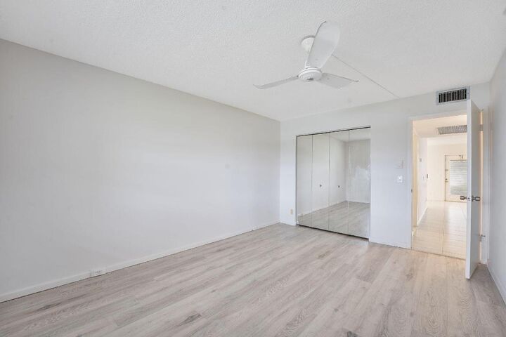 Property Photo:  1071 Guildford D  FL 33434 