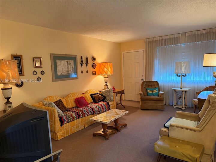 Property Photo:  165 NE 203rd Ter 30  FL 33179 