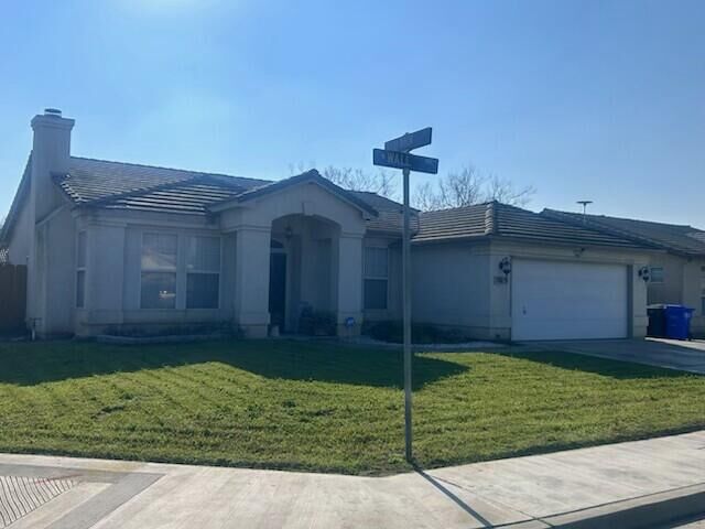 Property Photo:  1865 W Wall Avenue  CA 93257 