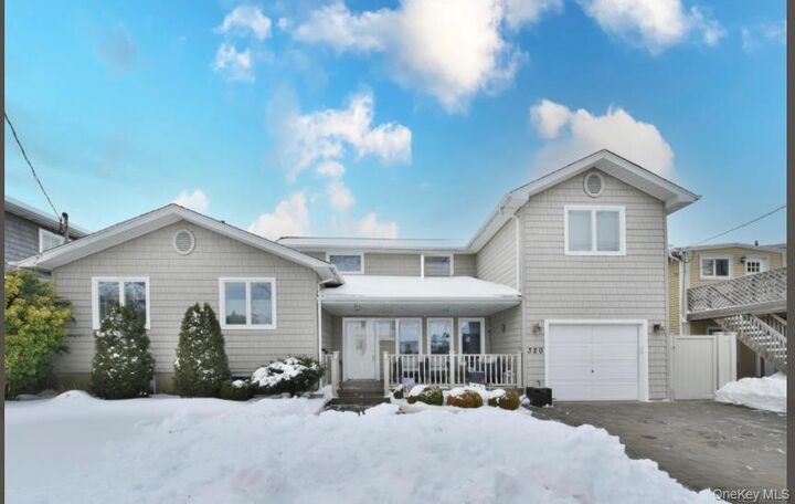 Property Photo:  320 Roosevelt Avenue  NY 11762 