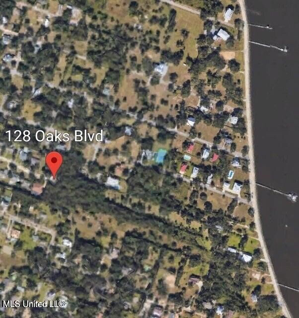 Property Photo:  128 Oaks Boulevard  MS 39520 