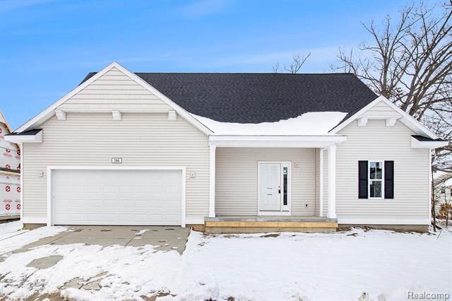 Property Photo:  386 Dorchester Drive  MI 48855 
