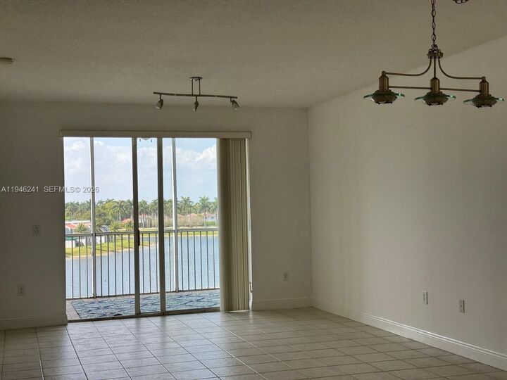 Property Photo:  10730 NW 66th St 411  FL 33178 