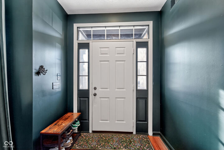 Property Photo: 8635 Woodstone Way W IN 46256