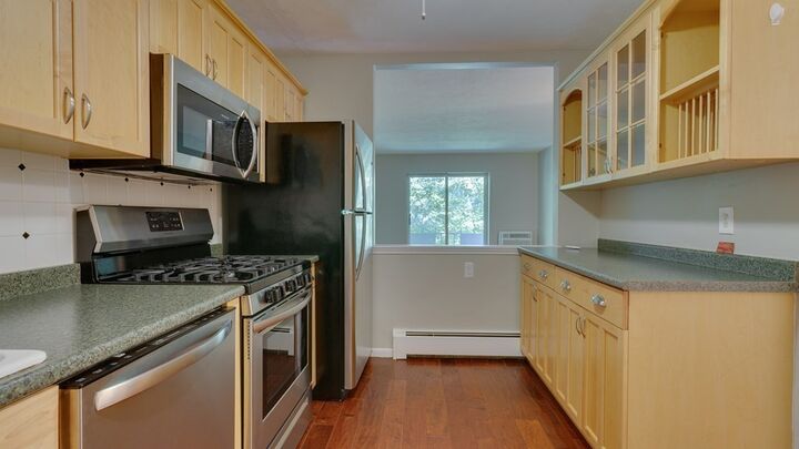 Property Photo: 135 Granite Ave 42 MA 02124