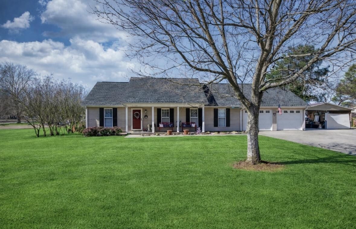 Property Photo:  1408 Edison Ave  AL 35661 - MUSCLE S 