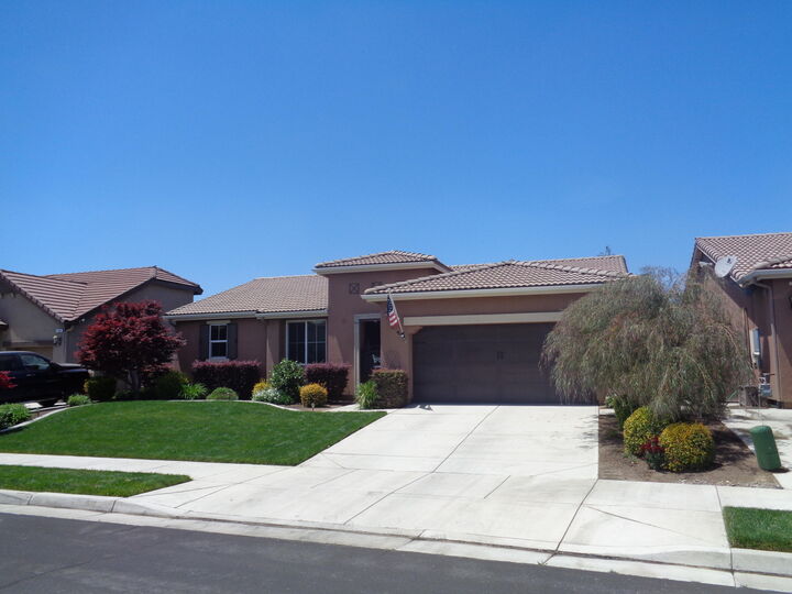 Property Photo:  1309 N University Court  CA 93291 