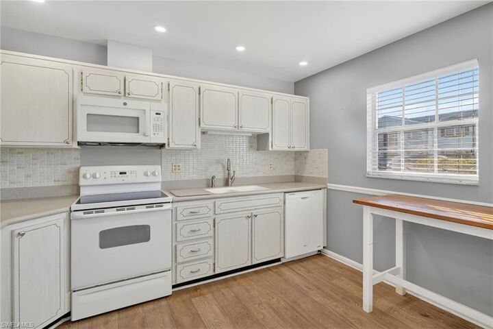 Property Photo:  8740 Lueck Ln N 1  FL 33919 