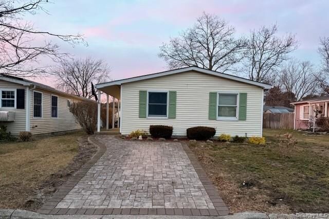 Property Photo: 42 Village Circle S NY 11949