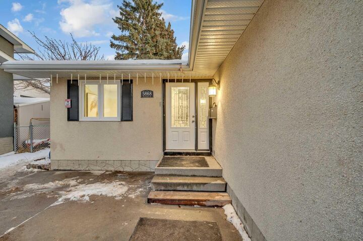 Property Photo: 5868 Dalcastle Drive NW AB T3A 2B6