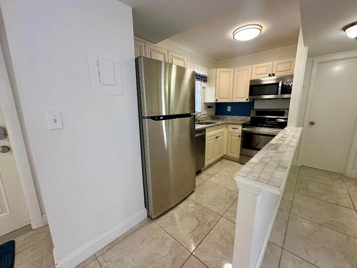 Property Photo:  1810 New Palm Way 417  FL 33435 