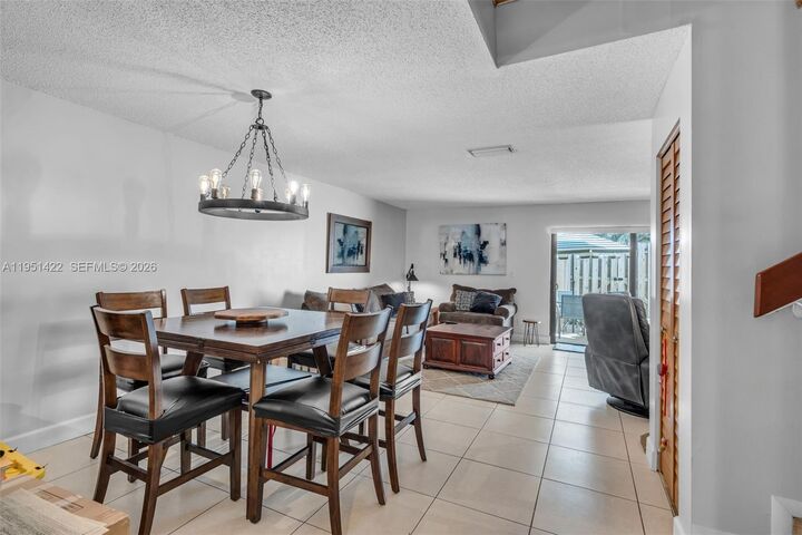 Property Photo:  1210 NW 99th Ave 66  FL 33024 