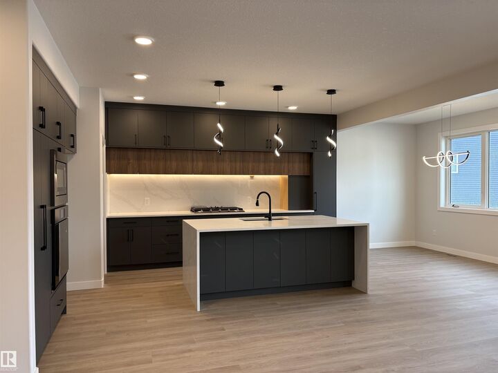Property Photo: 1039 151 Ave NW AB T5Y 4C8