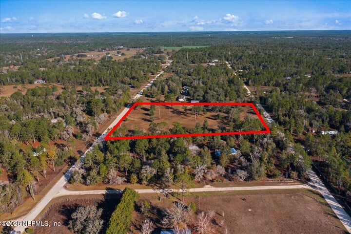 Property Photo: 5551 NE 106 Court FL 32621