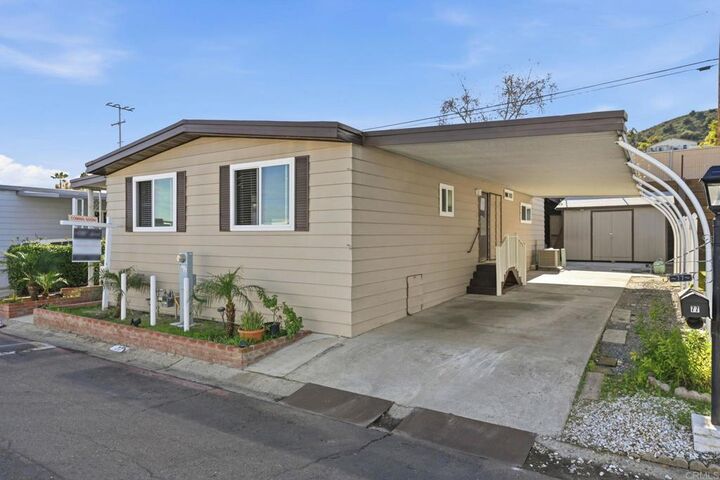 Property Photo: 8701 Mesa Road 77 CA 92071