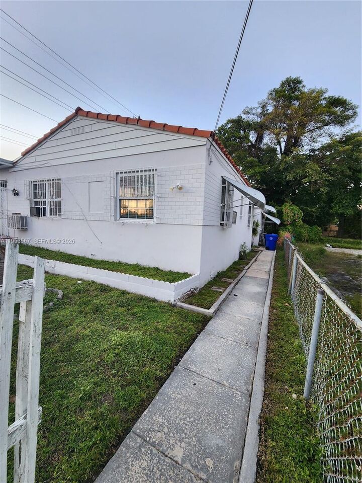 Property Photo:  405 NW 64th St 2  FL 33150 