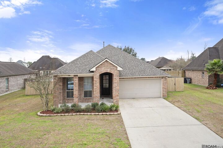 Property Photo:  20348 Grand Crus Ave  LA 70817 