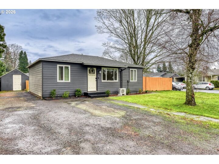 Property Photo:  1422 SE 169th Pl  OR 97233 