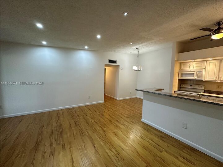 Property Photo:  9974 N Belfort 207  FL 33321 