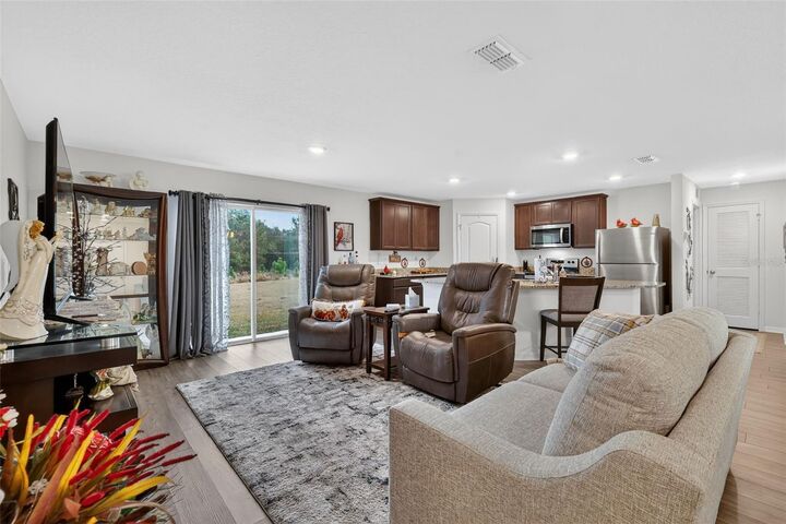 Property Photo:  12058 Callicarpa Lane  FL 34788 