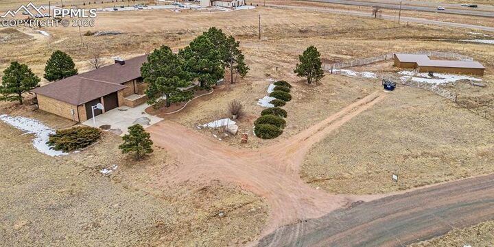 Property Photo:  7585 Ponca Road  CO 80908 