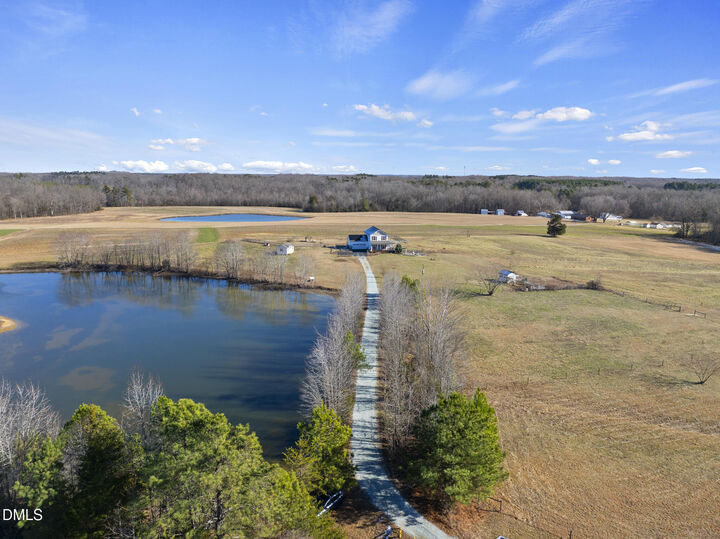 Property Photo:  201 Hurdle Mills Road  NC 27231 