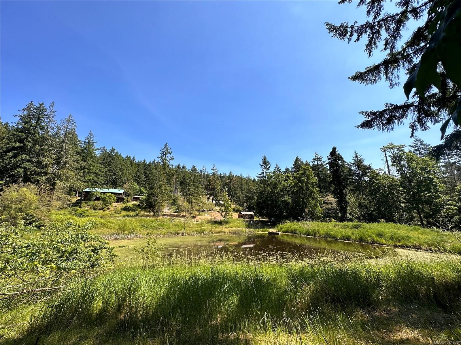 Property Photo:  370 Baker Rd  BC V8K 2N6 