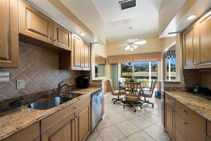 Property Photo:  5590 Golf Pointe Drive 5590  FL 34243 