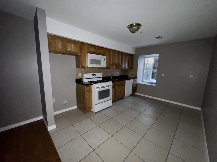 Property Photo:  6408 Polk St 1  NJ 07093 