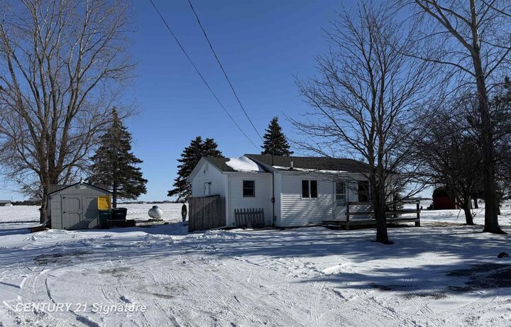 Property Photo:  6867 S 7 Mile Road  MI 48623 