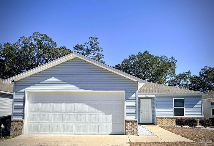 Property Photo:  7876 Maxton Rd  FL 32514 