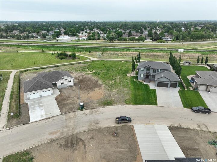 Property Photo: 236 Iron Bridge Drive SK S6J 0B5