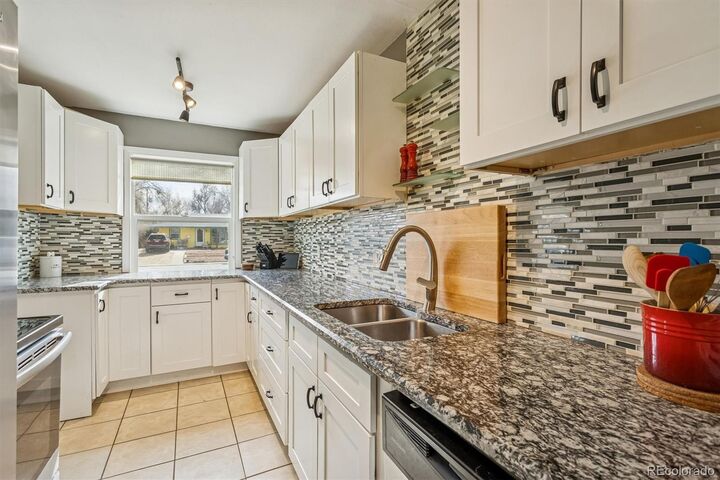 Property Photo:  4841 E Missouri Avenue  CO 80246 