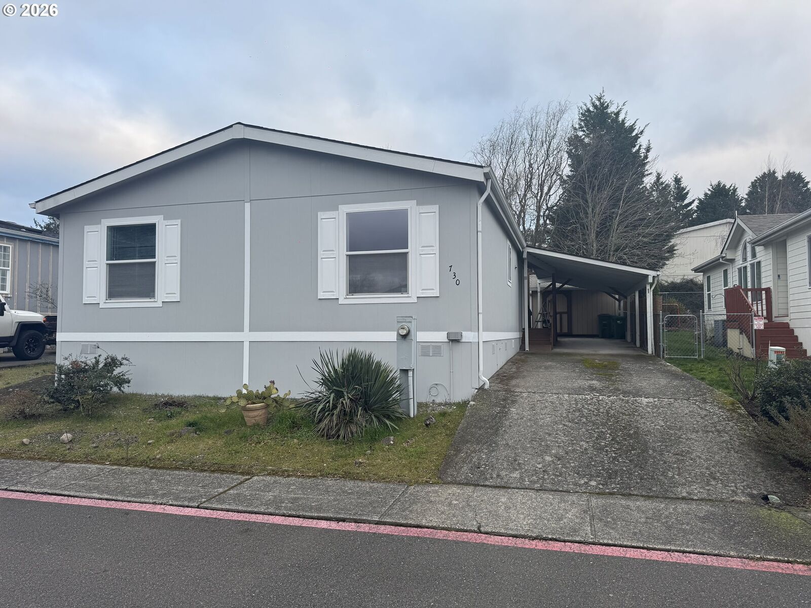 Property Photo: 730 SW Sunset Way SW 77 OR 97060