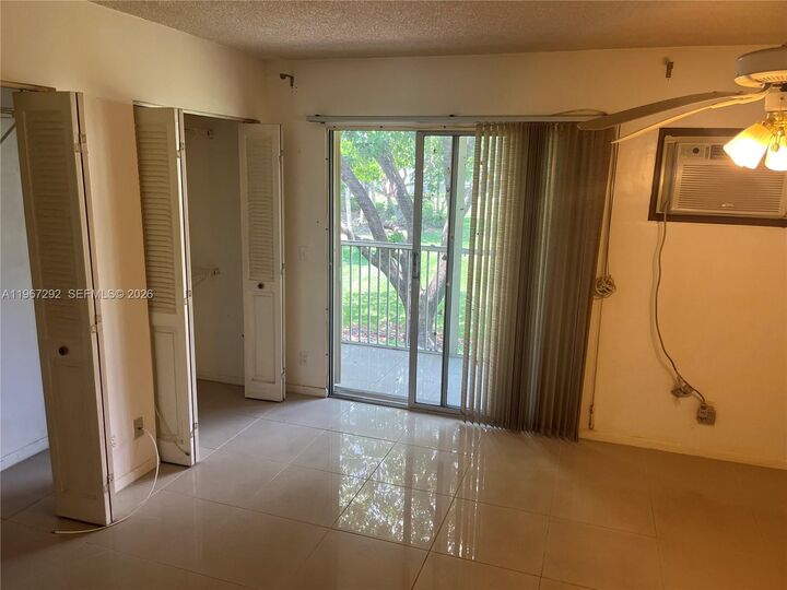 Property Photo: 150 SW 134th Way 209R FL 33027