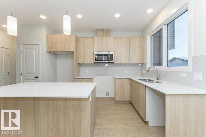 Property Photo:  17548 63 Street NW  AB T5Y 4A5 