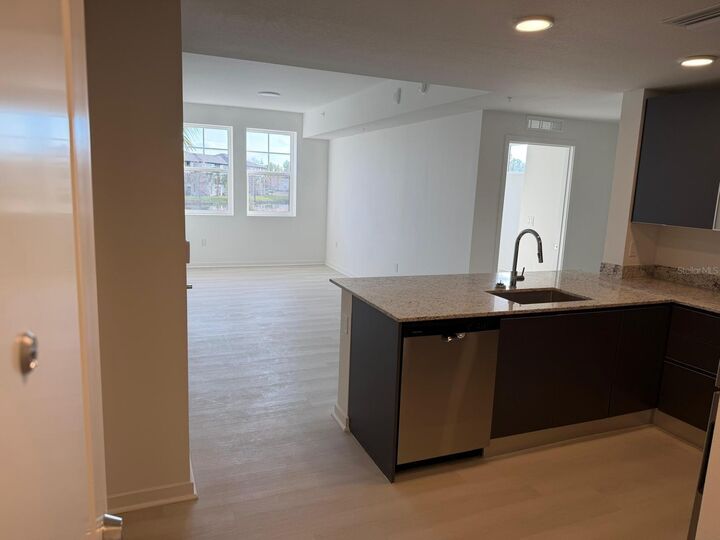 Property Photo:  5587 Millenia Park Boulevard 222  FL 32839 