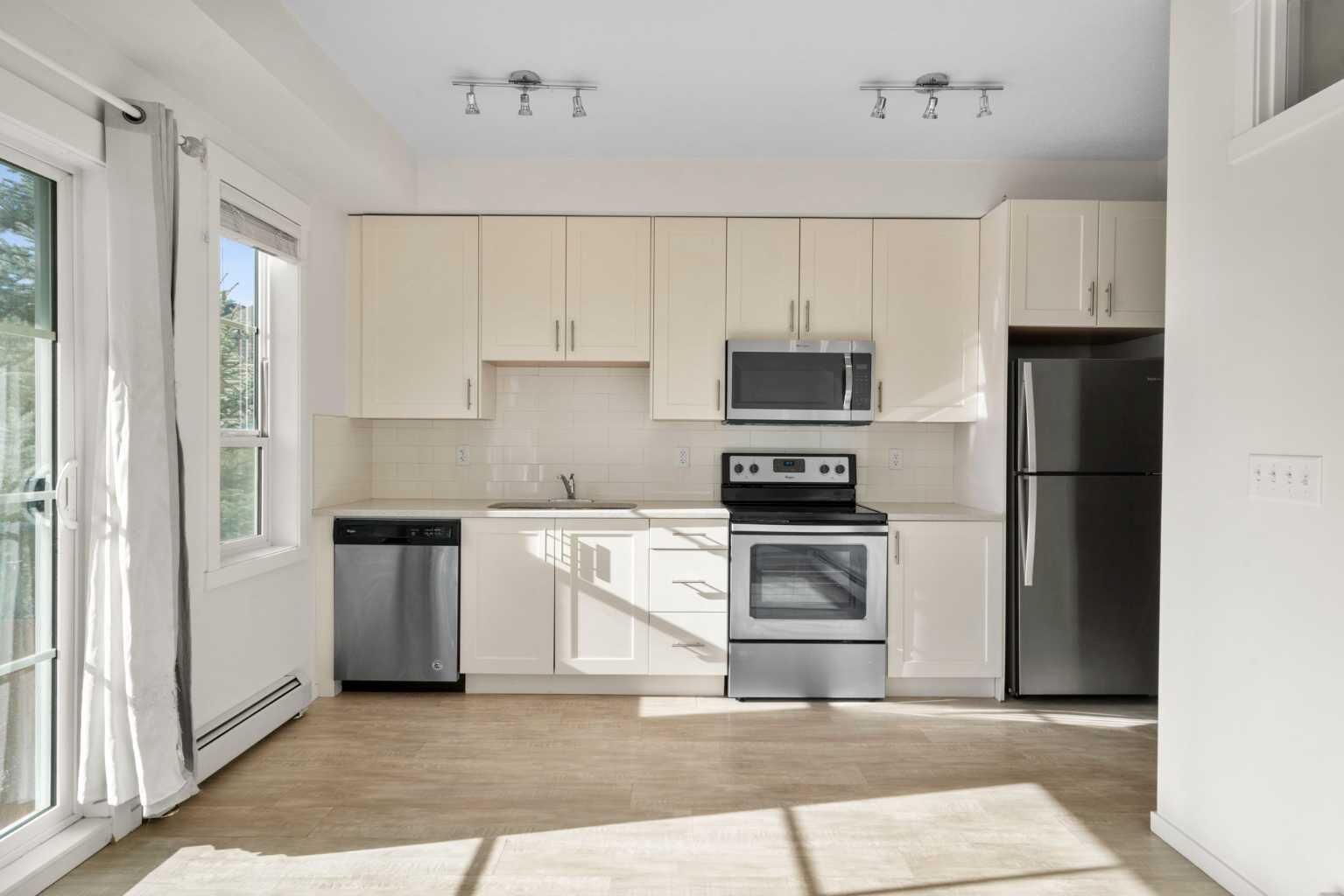 Property Photo:  215 Legacy Boulevard SE 2205  AB T2X 3Z5 